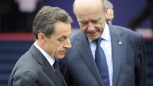 وزير الخارجية الفرنسي الان جوبيه مع الرئيس نيكولا ساركوزي
