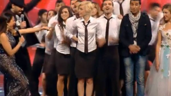 The delighted members of "Sima" congratulate each other as they're announced winners of Arabs Got Talent 2013. (Image: YouTube still)