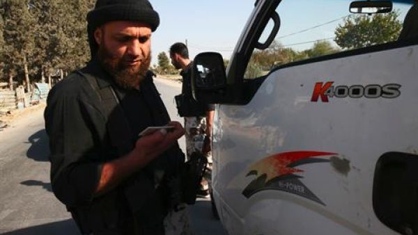 The suicide bombers reportedly detonated at a checkpoint manned by regime forces in Qara (Bassam Khabieh/Reuters) The suicide bombers reportedly detonated at a checkpoint manned by regime forces in Qara (Bassam Khabieh/Reuters)