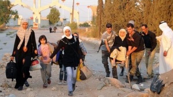 Approximately 3,800 residents were evacuated from Moadamiyet Al Sham in October (File Archive/AFP)