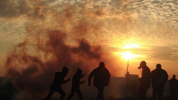Israelis fired tear gas on Palestinian protestors last week, leading to the death of an 85-year-old man (Jaafar Ashtiyeh/AFP)