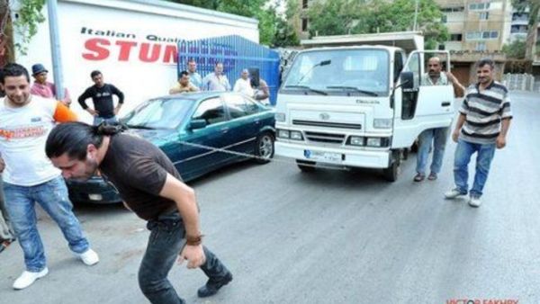 If your vehicle is stuck and there is no tow truck in sight, call this man! (photo via naharnet.com)