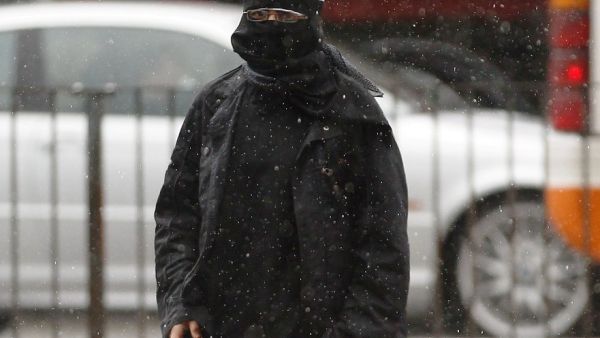 Women in full burqa would be contravening the law in Belgium