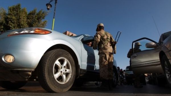 The Al Qaeda gunmen shot the three soldiers at a checkpoint Saturday (Mohammed Huwais/AFP)