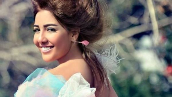 مي كساب وأبو تريكة