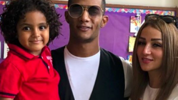 Ramadan posted a picture to his Instagram account in which he is carrying his son Ali and his wife stands next to him (Source: mohamedramadanws - Instagram)