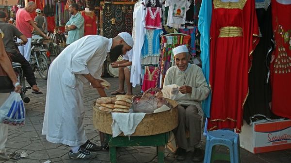 A man selling bread in front of a shop in Marrakesh. (Pixabay) A man selling bread in front of a shop in Marrakesh. (Pixabay)
