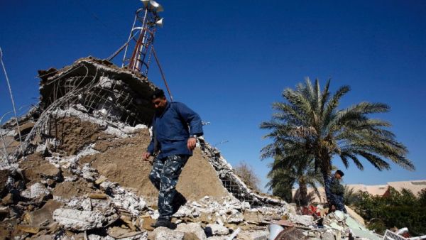 A man surveys the debris of the al-Fateh mosque, bombed by militants in Iraq earlier this year. (AFP/File)