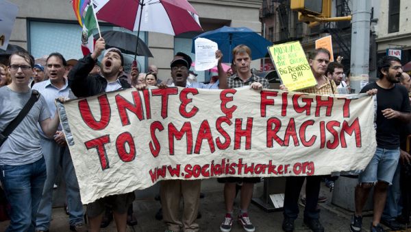 Protesters with the NYC Coalition to Stop Islamophobia rally near the proposed Islamic Center in New York on Aug. 22, 2010. (AFP/Don Emmert)