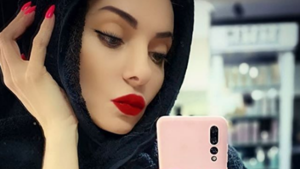 The Lebanese beauty captioned the picture 'This is a towel you idiots, I am drying my hair' (Source: myriamklinkk - Instagram)