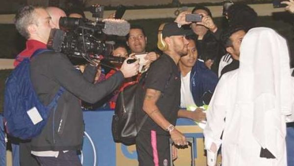 PSG’s Brazilian superstar Neymar poses for a selfie with fans in Doha yesterday. (Photo: Noushad Thekkayil)