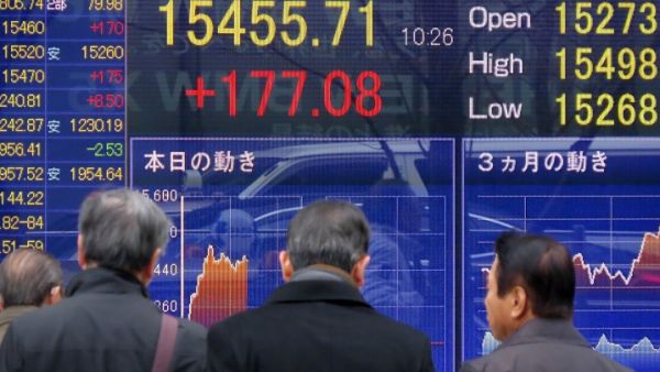 Japan's Nikkei 225 index fell 7.1 percent to 21,087.71 by early Tuesday afternoon, after a wild day for U.S. stock markets. (AFP) Japan's Nikkei 225 index fell 7.1 percent to 21,087.71 by early Tuesday afternoon, after a wild day for U.S. stock markets. (AFP)