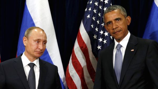 Barack Obama called for the removal of Syrian President Bashar al-Assad while Vladmir Putin said abandoning the current government would be a mistake. (AFP/File)