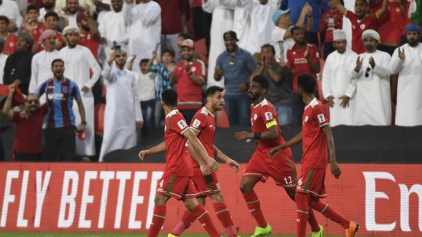  Oman and Turkmenistan looked set to be eliminated with a 1-1 draw, but two late goals sent the Gulf Cup champions through in the Asian Cup. 