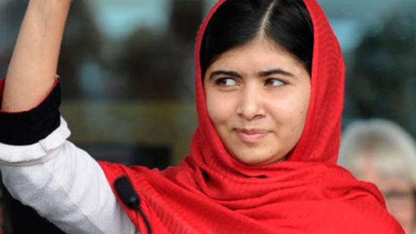Malala Yousafzai waves during the official opening of Birmingham's library. [gaurdian]