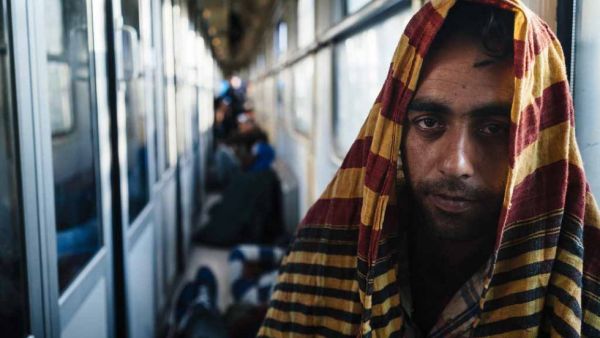 A Pakistani man travels on a train filled with other asylum-seekers bound for Belgrade, Serbia.  (AFP/Dimitar Dilkoff)