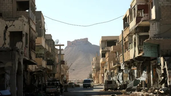 A picture taken on March 31, 2016 from the adjacent modern town shows a view of Fakhr-al-Din al-Ma'ani Castle, known as Palmyra citadel, on a hilltop in the ancient city of Palmyra, some 215 kilometres northeast of Damascus. (AFP/Joseph Eid)