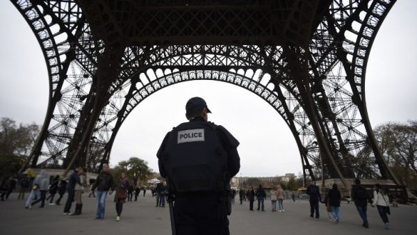 Police patrol in Paris on November 14, 2015 at the Eiffel Tower. (AFP/File)