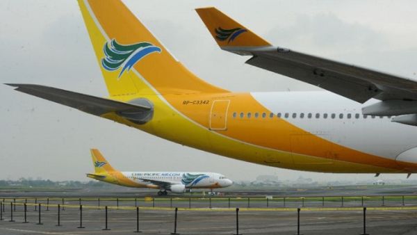 Filipino low-cost airline Cebu Pacific is suspending operations to and from Kuwait, Riyadh and Doha, claiming that these routes are no longer viable. (AFP/ Jay Directo) Filipino low-cost airline Cebu Pacific is suspending operations to and from Kuwait, Riyadh and Doha, claiming that these routes are no longer viable. (AFP/ Jay Directo)