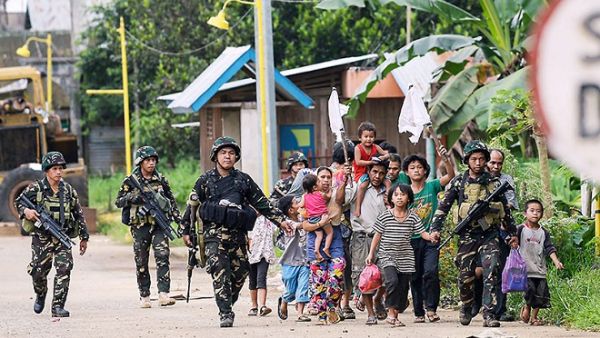 More than 230,000 residents have been displaced and at least 390 people, mostly militants, have been killed in Marawi since May 23, 2017. (AFP)