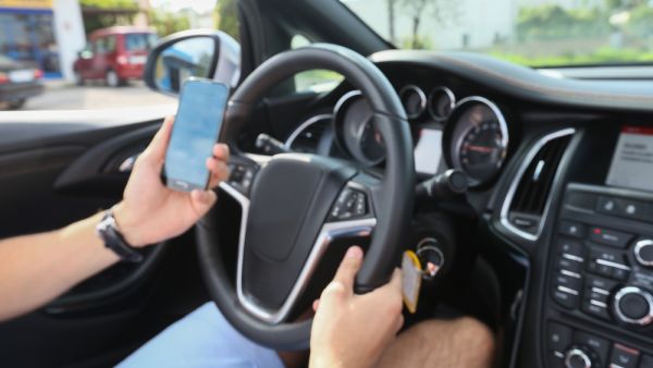 Motorists caught using their cell phones while driving in Saudi Arabia will now spend 24 hours in jail. (Shutterstock)