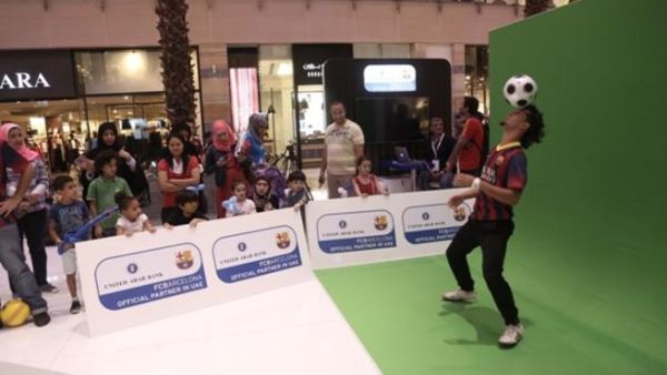 Free Styler wows the visitors by performing soccer tricks at the UAB stand organised for the bank's alliance with FC Barcelona Free Styler wows the visitors by performing soccer tricks at the UAB stand organised for the bank's alliance with FC Barcelona