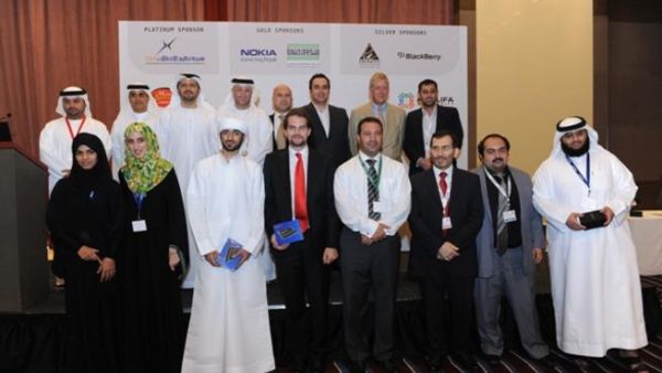 The four winning group of students with their supervisors, sponsors and organizers