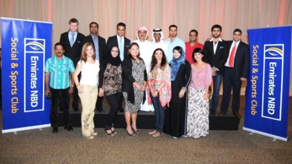 Abdulhakim Binherz, GM Legal Affairs, Fraud Prevention and Investigations with staff members at Emirates NBD staff Iftar