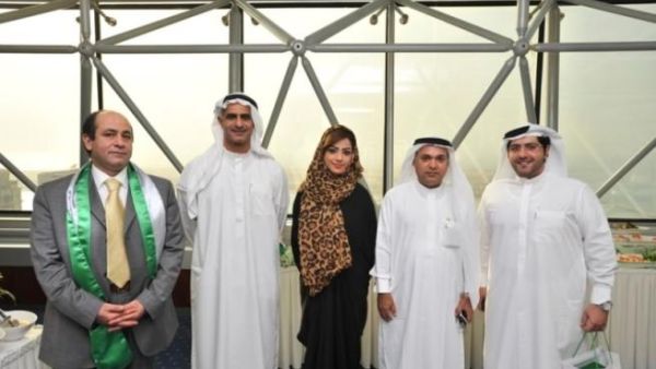 NBAD senior officials, Saif Al Shehhi and Ehab Anis Hassan with some of the graduates