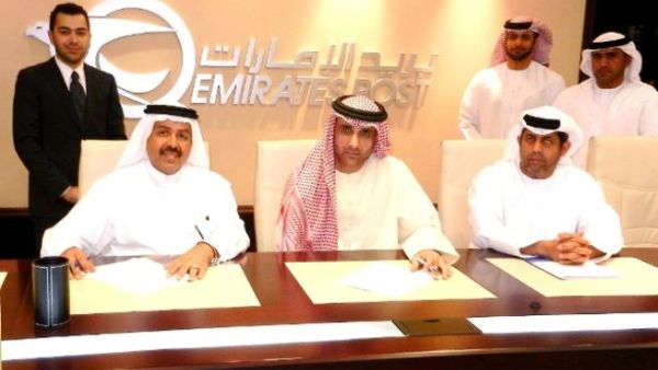 Al Tanmyah Services signs an agreement with Emirates Post Group