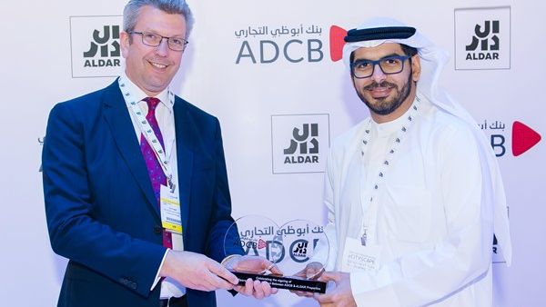 Talal Al Dhiyebi, Chief Development Officer at Aldar Properties and Colin Fraser, Group Head of Wholesale Banking at Abu Dhabi Commercial Bank, sign the ESCROW Agreement during Cityscape Abu Dhabi