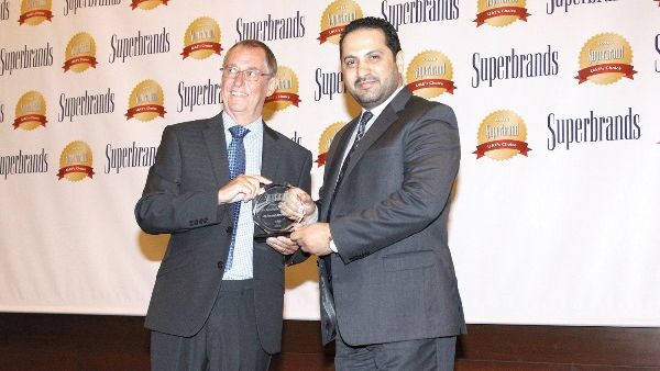 Ali Al Najjar, Assistant General Manager and Head of Operations Department at Al Ansari Exchange, receiving the Superbrand trophy at the gala night of the prestigious Superbrands Tribute Event Ali Al Najjar, Assistant General Manager and Head of Operations Department at Al Ansari Exchange, receiving the Superbrand trophy at the gala night of the prestigious Superbrands Tribute Event