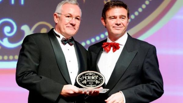 Bruno Huber, General Manager of Mövenpick Resort & Spa Dead Sea and Regional Manager Jordan receives the award as Green Hotelier of the Year Bruno Huber, General Manager of Mövenpick Resort & Spa Dead Sea and Regional Manager Jordan receives the award as Green Hotelier of the Year