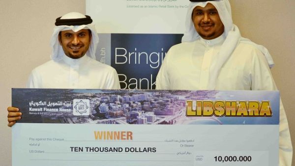 Mr. Subah Al Zayani with the winner of USD 10,000 Mr. Isa AlKaabi Mr. Subah Al Zayani with the winner of USD 10,000 Mr. Isa AlKaabi