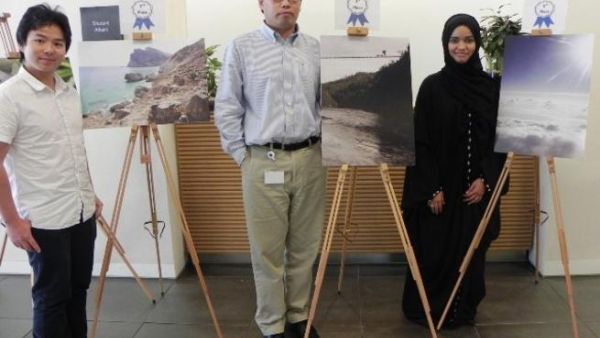 Winners of the Student/Faculty/Staff Photo Exhibition, Su Liu, Dr. Michael Xiao and Khasaiba Al Dalal with their photographs