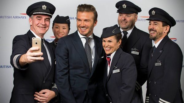 David Beckham poses for a selfie with Briitsh Airways pilots and cabin crew Wouter Kingma David Beckham poses for a selfie with Briitsh Airways pilots and cabin crew Wouter Kingma