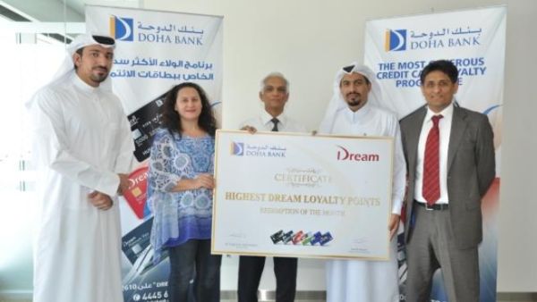 Doha Bank customer receives free air tickets from redeemed points