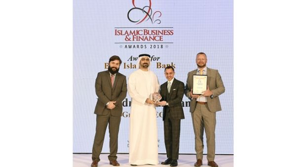 Dr. Adnan Chilwan, Group CEO, DIB, receives the award during the ceremony.
