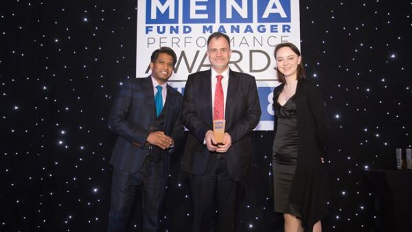 Dr. Husayn Shahrur, NBK Capital’s Managing Director of Regional receiving the award.