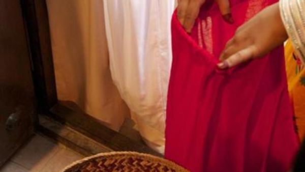 Women celebrating mid Sha’aban by making preparations for Ramadan while children visit homes singing songs and are presented with sweets