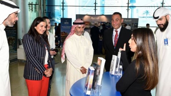 KPC officials visiting Burgan Bank booth.