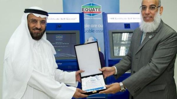 EQUATE President and CEO Mohammad Husain with PACI Deputy Director General Mansour Al-Methen
