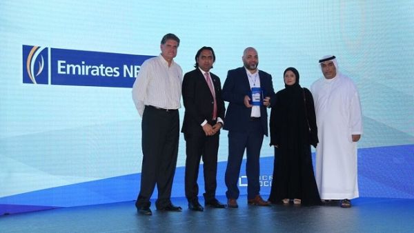 Emirates NBD receives the ‘Innovation in Hybrid IT Management’ award from Micro Focus. Emirates NBD receives the ‘Innovation in Hybrid IT Management’ award from Micro Focus.