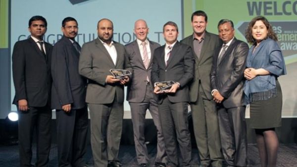 Emrill management team with their awards 'FM Company of the Year' and 'Green Initiative of the Year' at the Facilities Management Middle East Awards held in Dubai