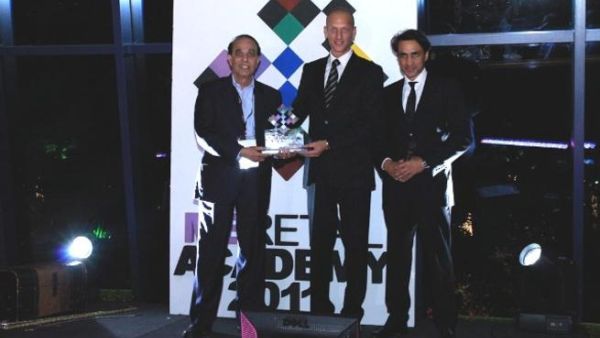 Eros representative receiving the award Eros representative receiving the award