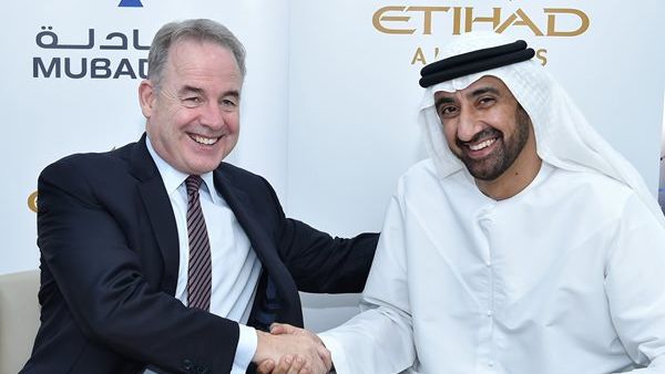 James Hogan, Etihad Airways’ President and Chief Executive Officer, with Homaid Al Shemmari, Chief Executive Officer, Aerospace and Engineering Services, Mubadala, after signing ‎an MoU to expand their companies' strategic partnership