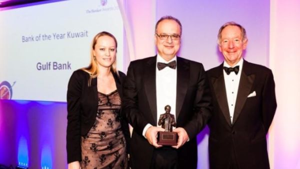 Mr. Michel Accad, Chief Executive Officer at Gulf Bank accepting the ‘Bank of the Year’ award from Melissa Hancock, Middle East Editor of ‘The Banker’ and Michael Buerk, Former BBC news presenter during the awards ceremony in London