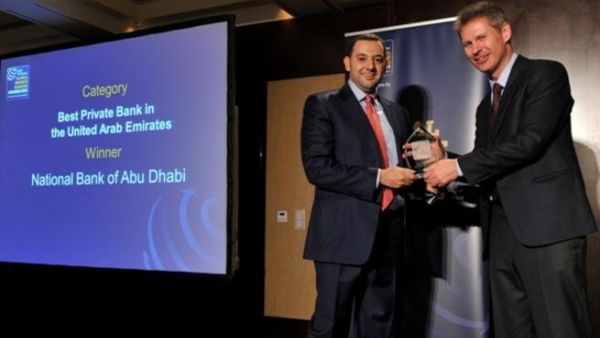 Hani AlNabulsi, Head of Business Development & Marketing in Private Banking at NBAD receives “Best Private Bank in UAE for 2013” award from Yuri Bender, Editor of Professional Wealth Management Magazine Hani AlNabulsi, Head of Business Development & Marketing in Private Banking at NBAD receives “Best Private Bank in UAE for 2013” award from Yuri Bender, Editor of Professional Wealth Management Magazine