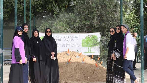 Employees from DP World Head office planting local Ghaf trees in Dubai