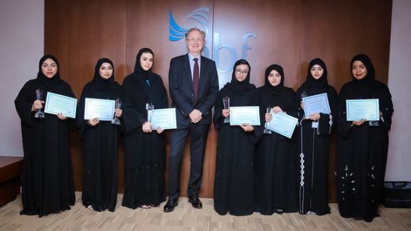 The graduates with the bank's CEO Vince Cook.